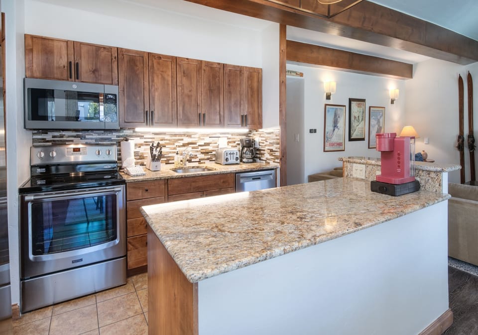 Condo, 2 Bedrooms | Private kitchen | Fridge, microwave, oven, dishwasher