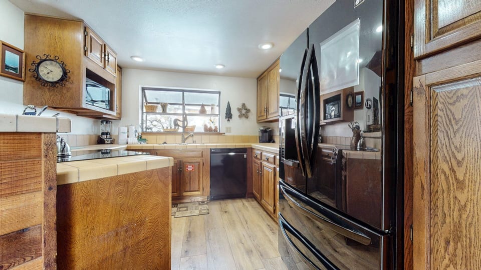 Condo, 2 Bedrooms | Private kitchen | Full-size fridge, microwave, oven, stovetop