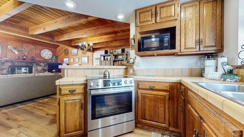 Condo, 2 Bedrooms | Private kitchen | Full-size fridge, microwave, oven, stovetop