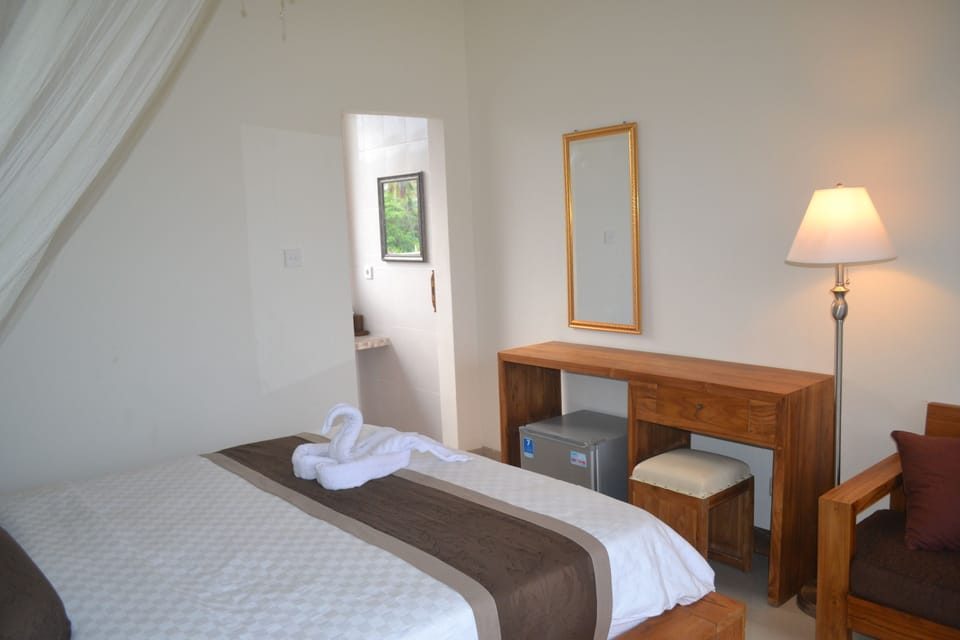 Deluxe Room, Ocean View | 1 bedroom, premium bedding, desk, free WiFi