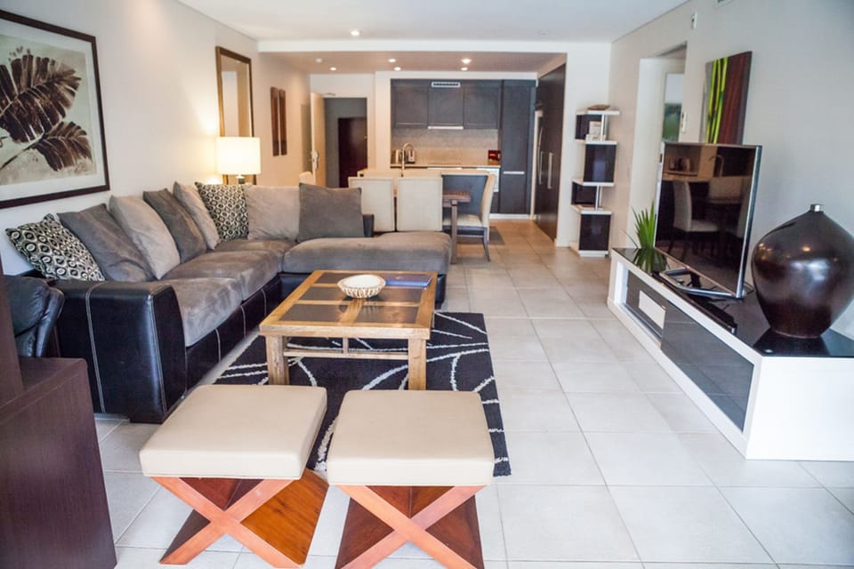 Luxury Apartment, 2 Bedrooms, Pool View, Poolside | Living area | Flat-screen TV
