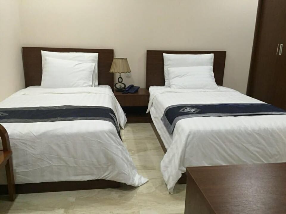 Twin Room | Minibar, desk, WiFi (free)