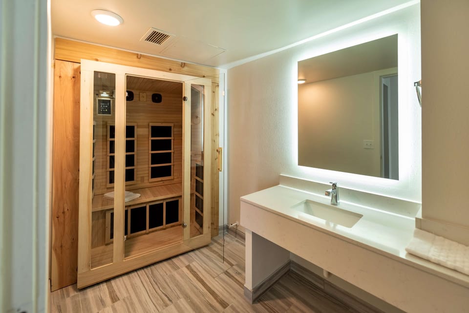 Suite, Multiple Beds, Non Smoking, Kitchenette (Walk-in Shower) | Desk, laptop workspace, blackout drapes, iron/ironing board