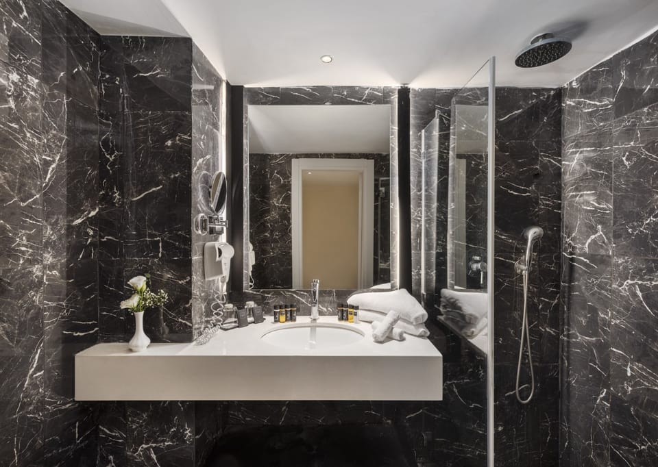 Kinneret Garden | Bathroom | Free toiletries, hair dryer, towels, soap