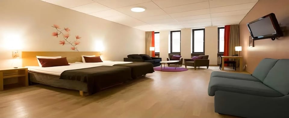 Room, Multiple Beds | Blackout drapes, soundproofing, iron/ironing board, cribs/infant beds