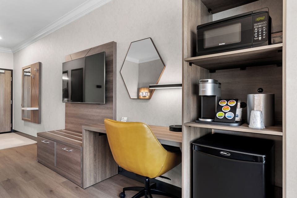 Desk, blackout drapes, iron/ironing board, cribs/infant beds