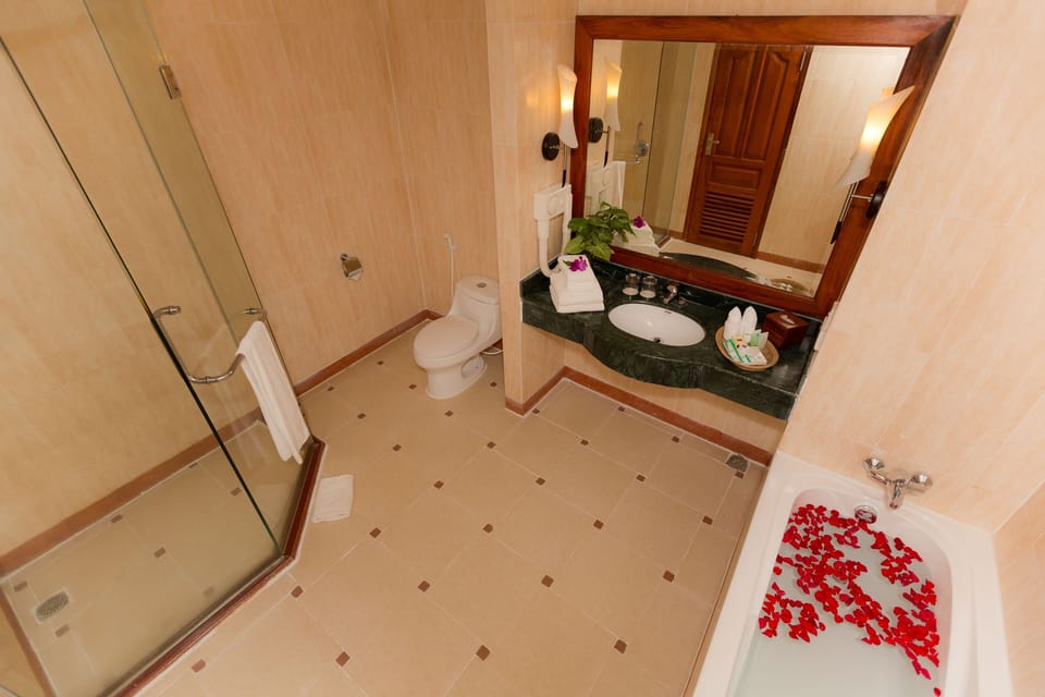 Separate tub and shower, deep soaking tub, designer toiletries