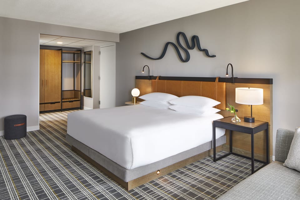 Executive Balcony Suite | Down comforters, in-room safe, desk, laptop workspace