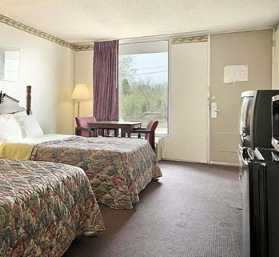 Desk, laptop workspace, free WiFi, bed sheets