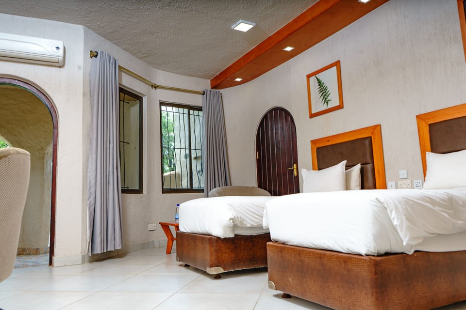 Twin Room | Egyptian cotton sheets, premium bedding, down comforters