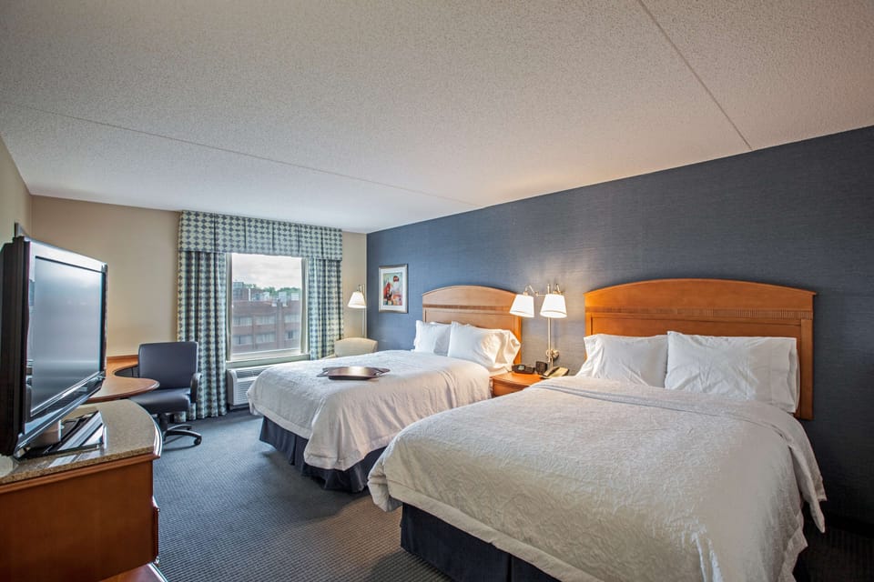 Premium bedding, down comforters, pillowtop beds, in-room safe