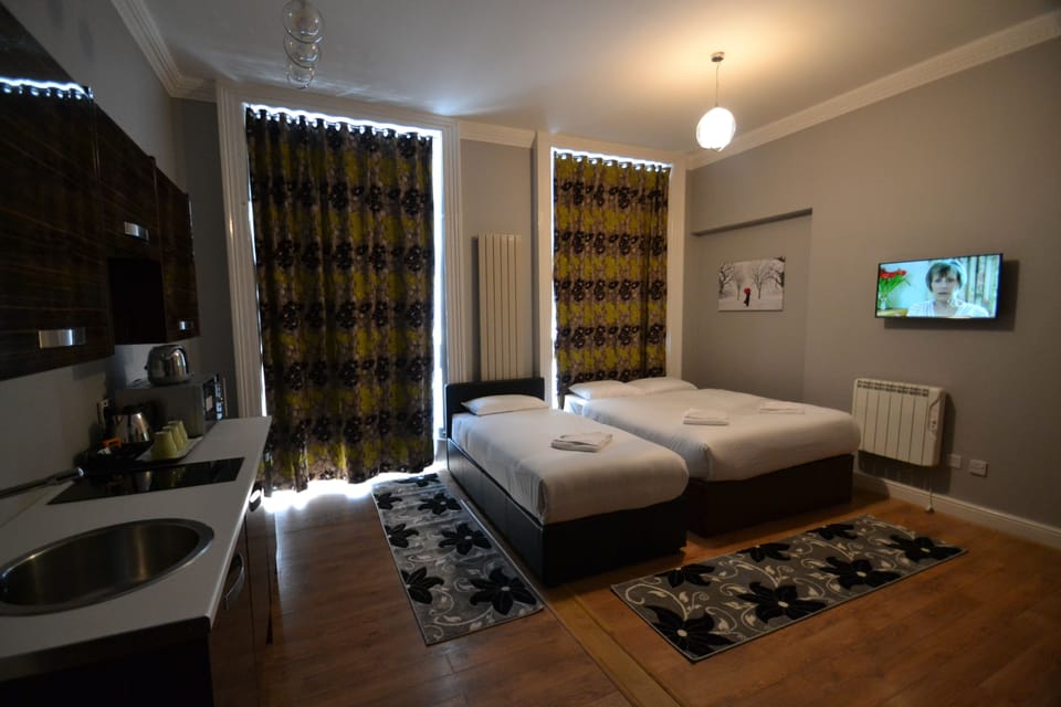Standard Studio (1 Double and 1 Single Bed) | In-room safe, iron/ironing board, WiFi (free), bed sheets
