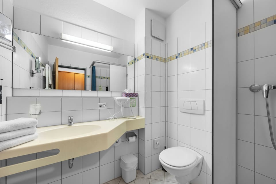 Shower, free toiletries, hair dryer, towels