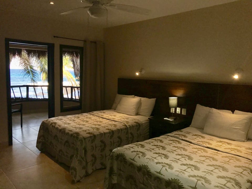 Classic Ocean Front | Minibar, in-room safe, individually decorated, individually furnished