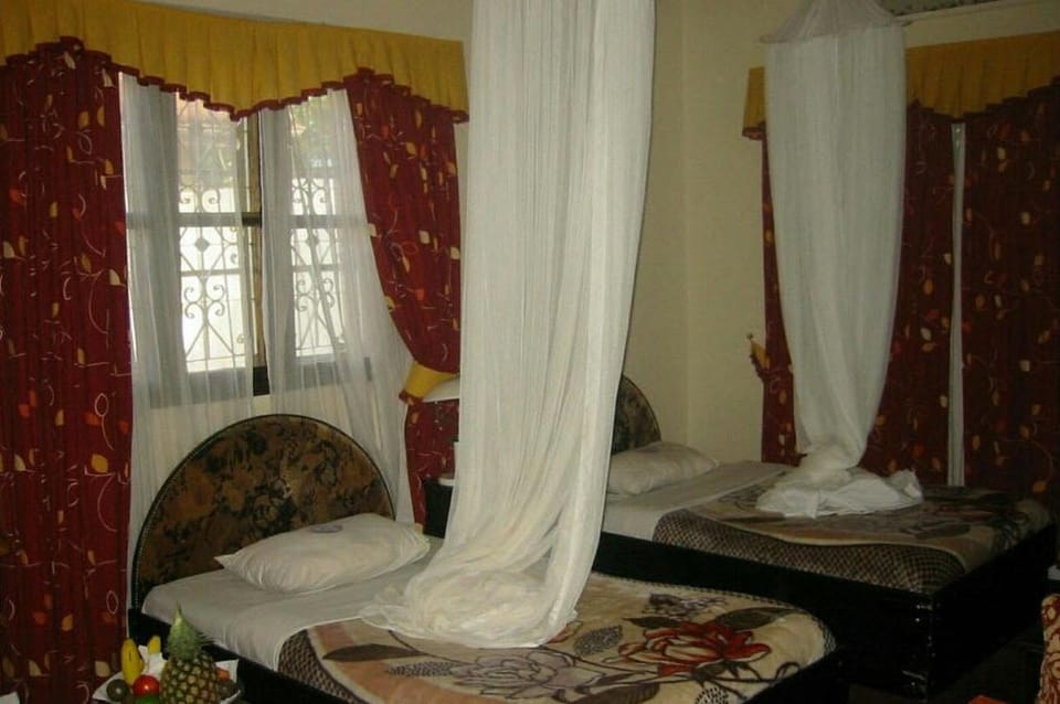 Basic Twin Room, 2 Twin Beds, Non Smoking, Garden View | Desk, iron/ironing board, cribs/infant beds, rollaway beds