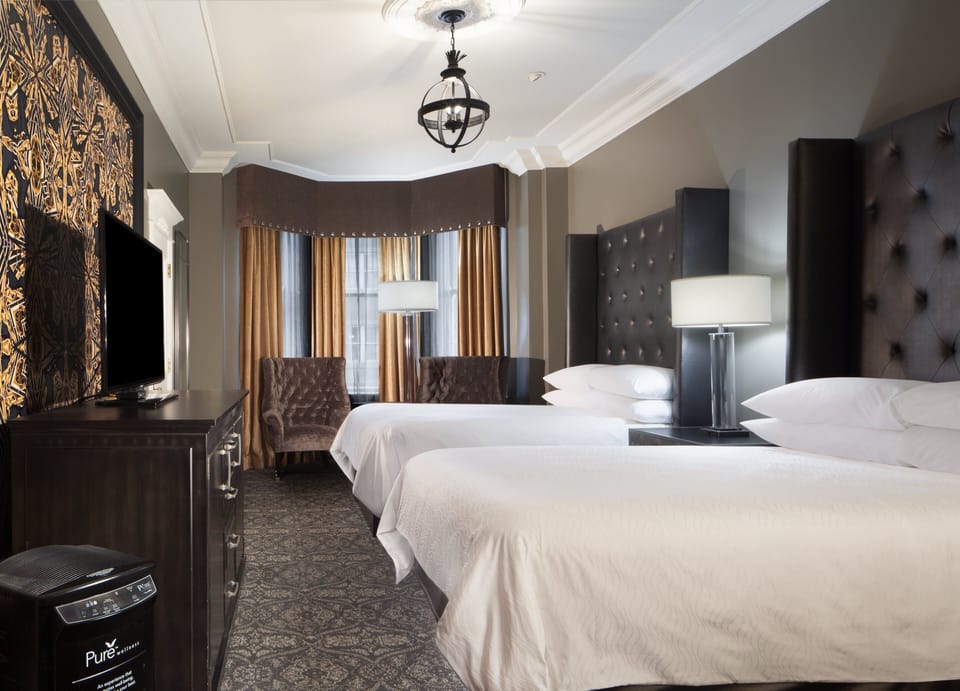 Premium bedding, pillowtop beds, in-room safe, blackout drapes