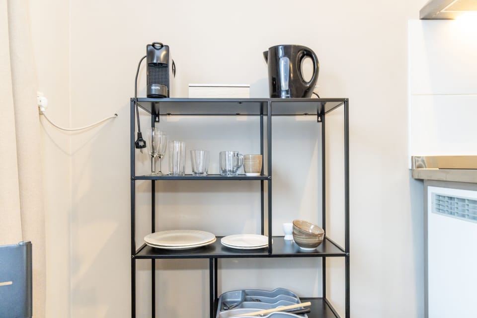 Studio, 1 Queen Bed | Private kitchen | Fridge, stovetop, coffee/tea maker, electric kettle