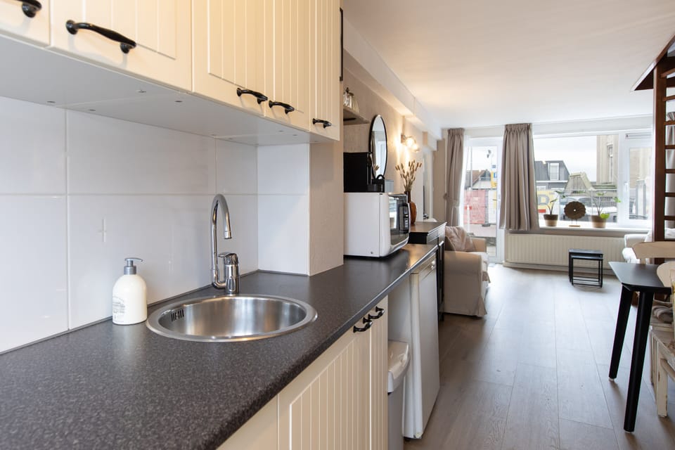 Family Apartment | Private kitchen | Fridge, stovetop, coffee/tea maker, electric kettle