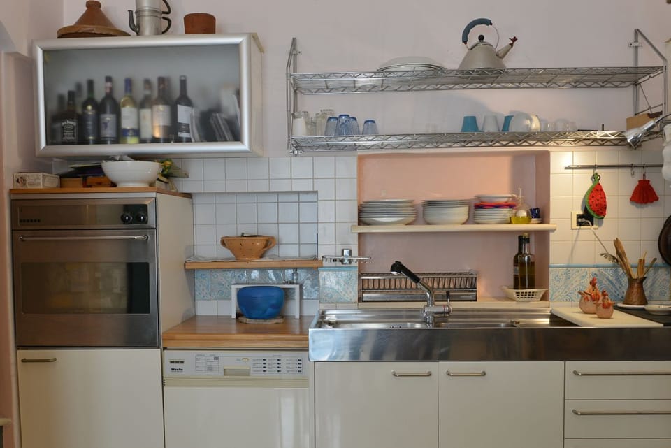 Deluxe Apartment, 1 Queen Bed with Sofa bed, Accessible, Non Smoking (in cave) | Private kitchen | Fridge, oven, stovetop, coffee/tea maker