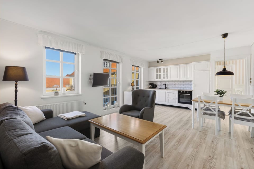 Deluxe Apartment, 1 Bedroom, Kitchen | Living area | 30-inch TV with cable channels