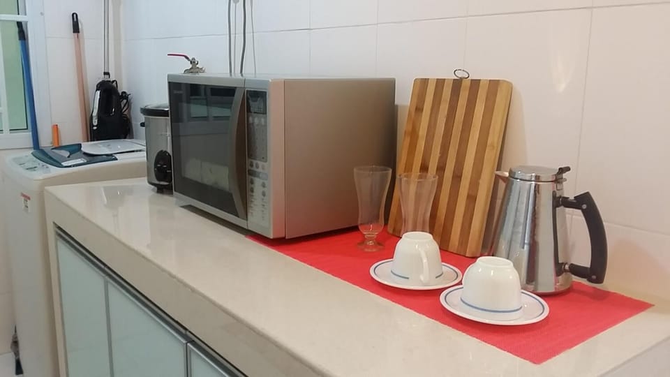 Apartment, Balcony | Private kitchen | Full-size fridge, microwave, stovetop, electric kettle