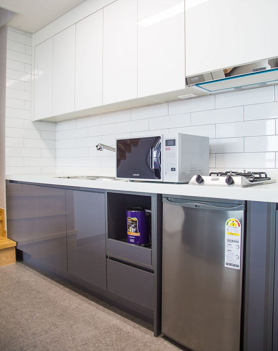 Family Suite (Duplex) | Private kitchen | Mini-fridge, microwave, coffee/tea maker, electric kettle