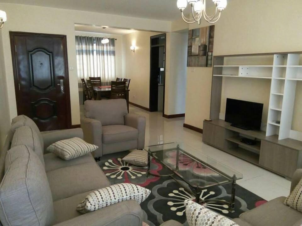 Executive Apartment, 2 Bathrooms, Pool View | Living area | 42-inch flat-screen TV with cable channels, TV, fireplace