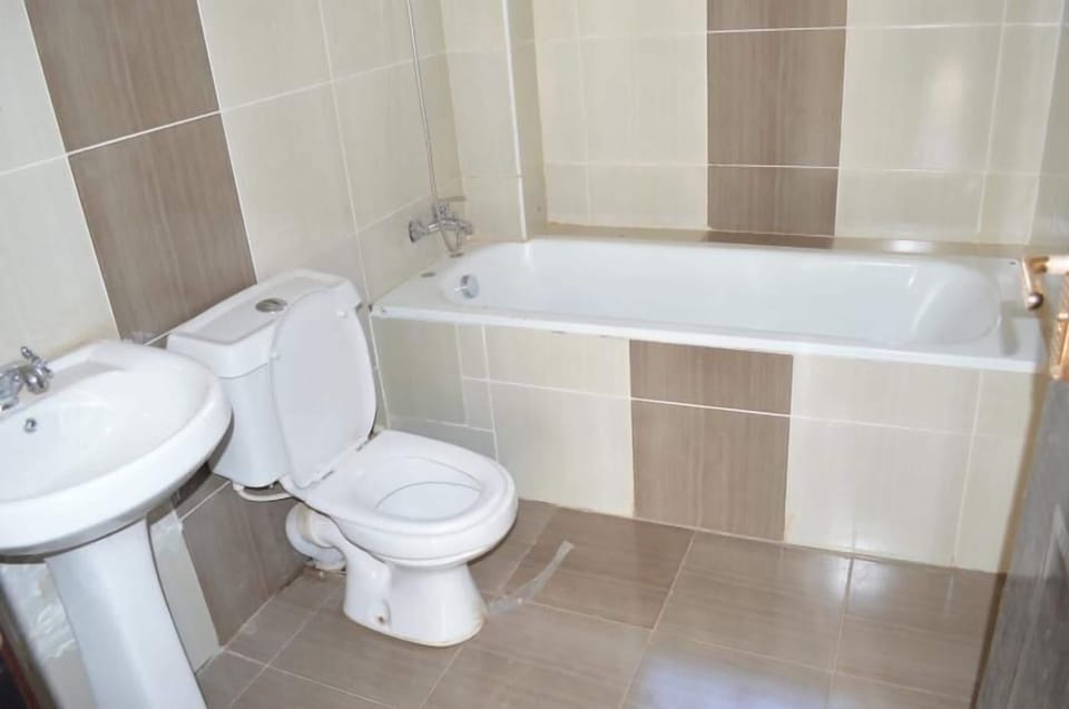 Executive Apartment, 2 Bathrooms, Pool View | Bathroom | Combined shower/tub, deep soaking tub, rainfall showerhead