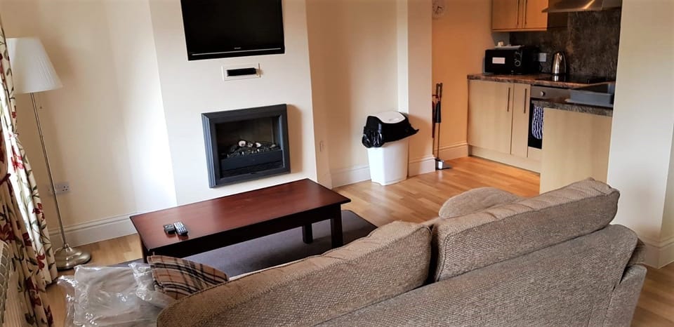 Apartment, 2 Bedrooms | Living area | Flat-screen TV