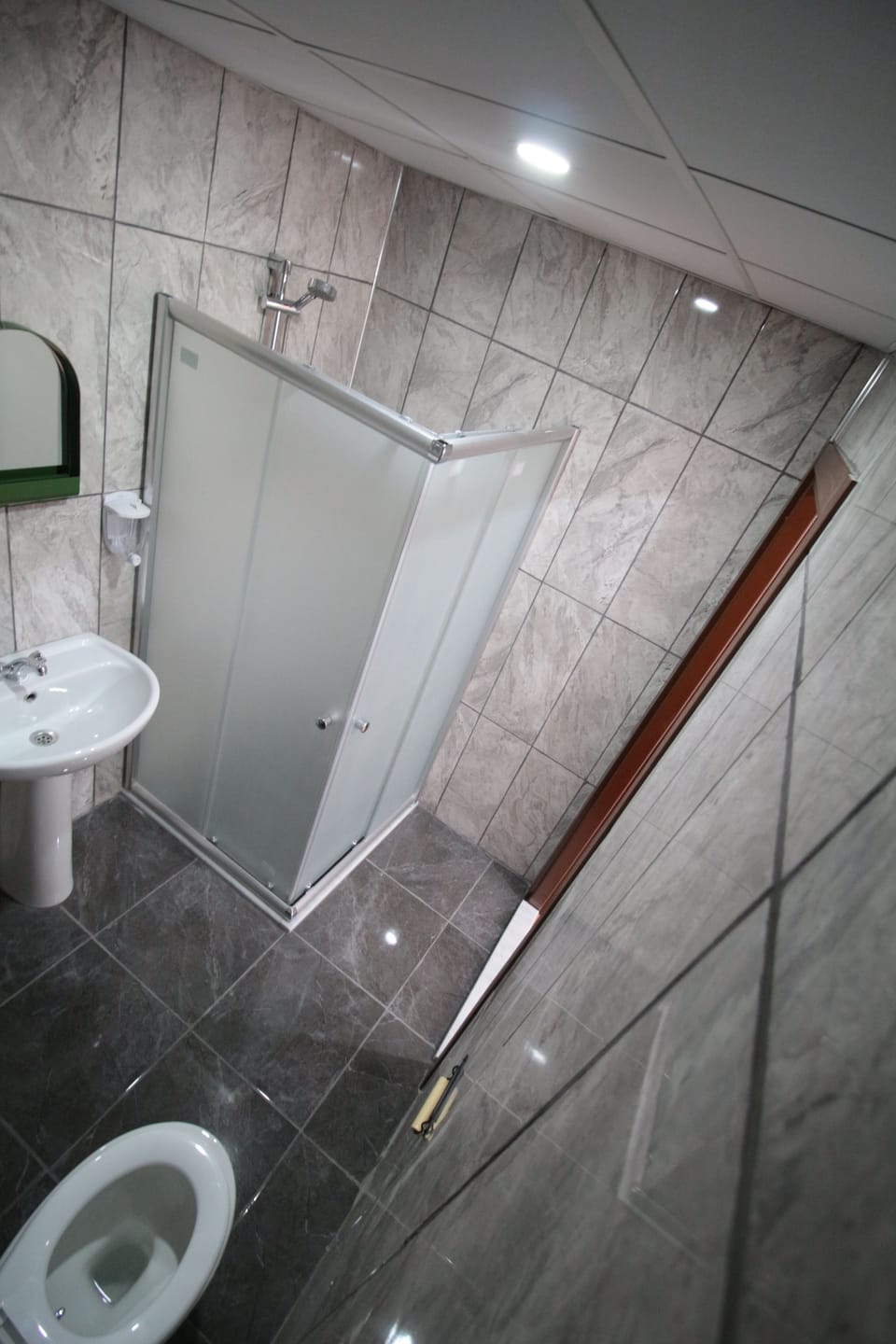 Shower, free toiletries, hair dryer, slippers