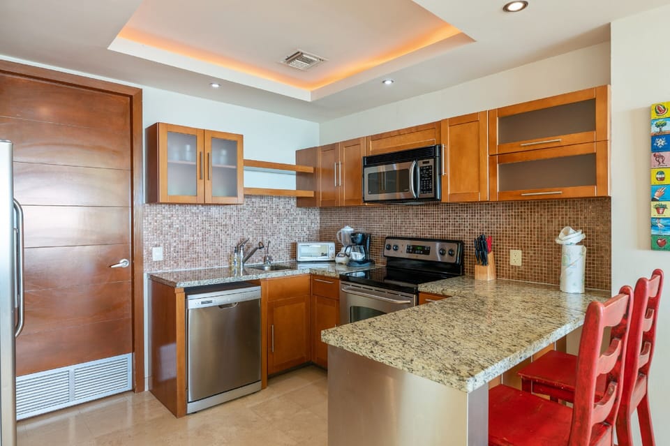 Condo | Private kitchen | Full-size fridge, microwave, oven, stovetop
