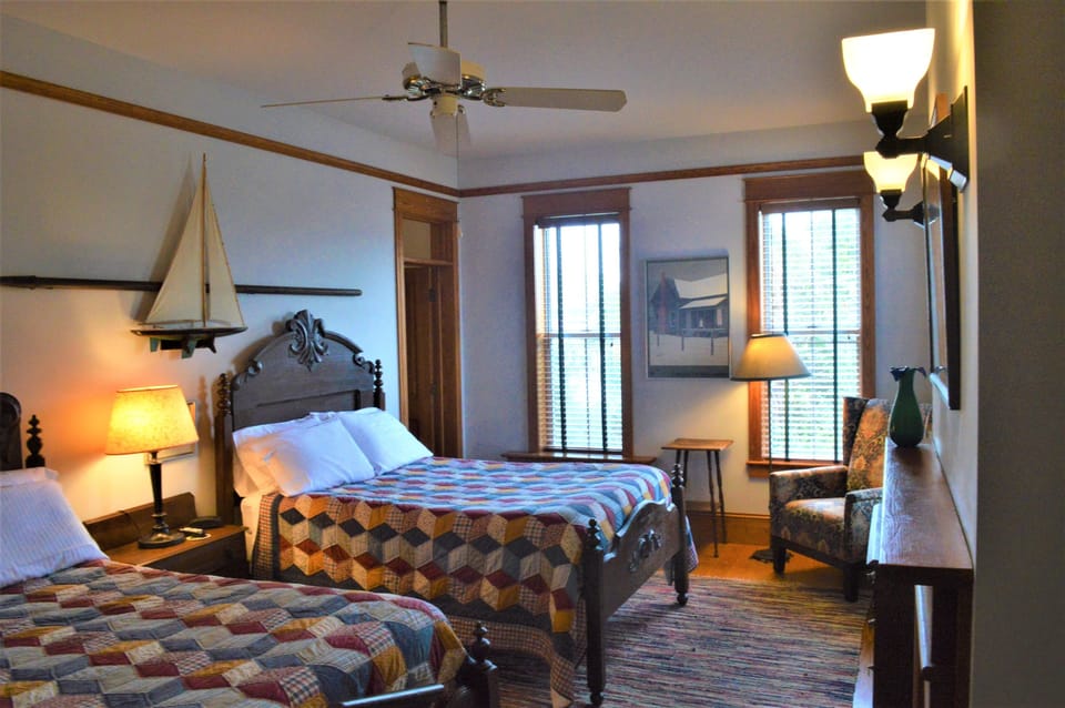 Classic Double Room, 2 Double Beds, Private Bathroom, Bay View | Individually decorated, individually furnished, desk, iron/ironing board