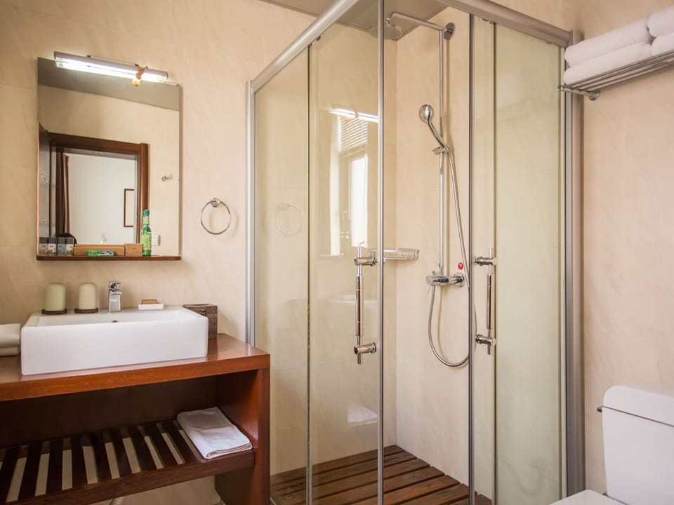 Shower, free toiletries, hair dryer, bathrobes