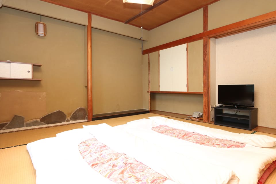 Economy Japanese Style Room with Shared Bathroom, Smoking | Bed sheets