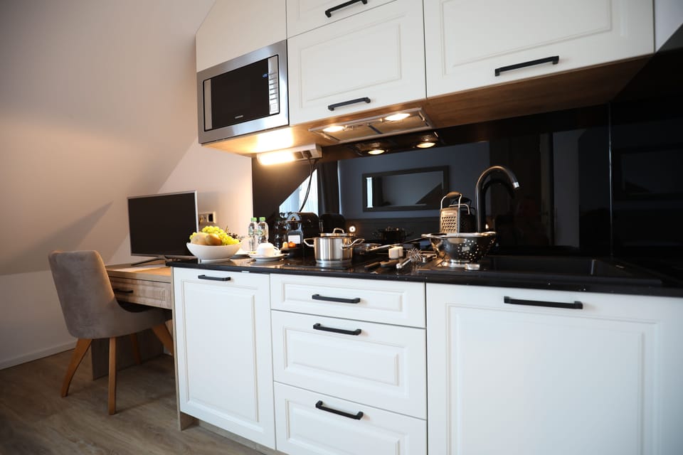 Junior Studio Suite | Private kitchen | Fridge, microwave, stovetop, espresso maker