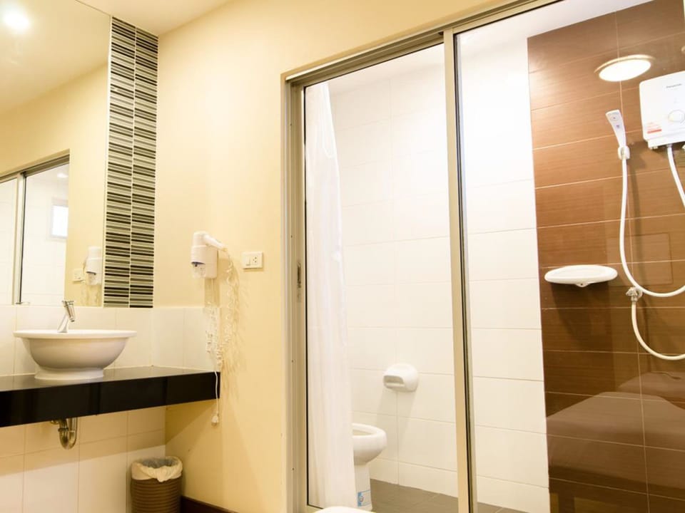 Shower, free toiletries, hair dryer, slippers