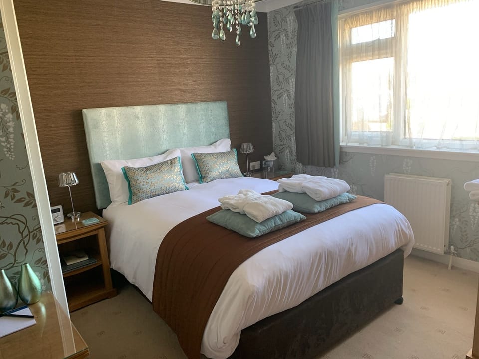 Premium bedding, down comforters, individually decorated