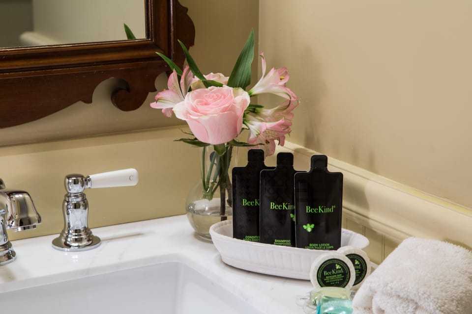 Designer toiletries, hair dryer, bathrobes, towels