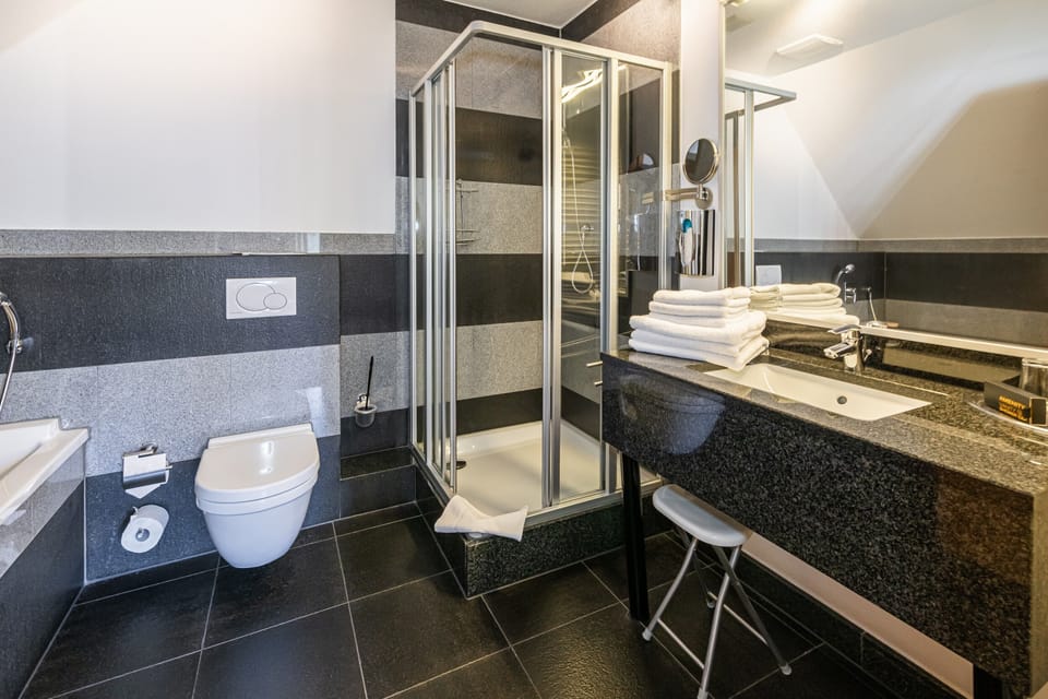 Apartment, 1 Queen Bed | Bathroom | Separate tub and shower, hair dryer, towels, soap