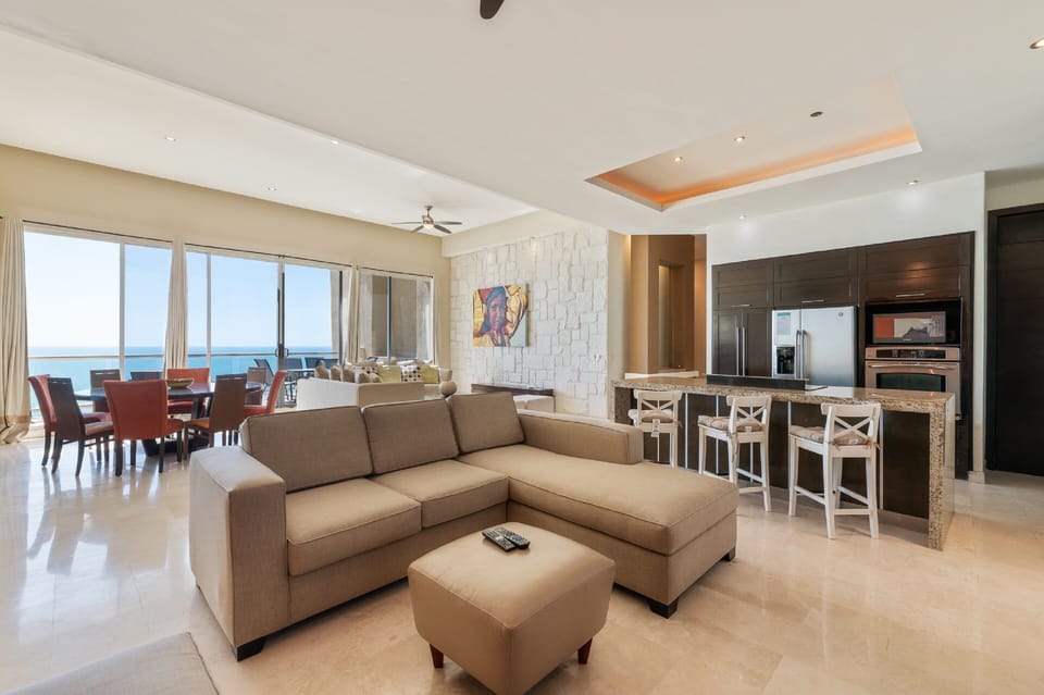 Panoramic Condo, 4 Bedrooms | Living area | Flat-screen TV, DVD player
