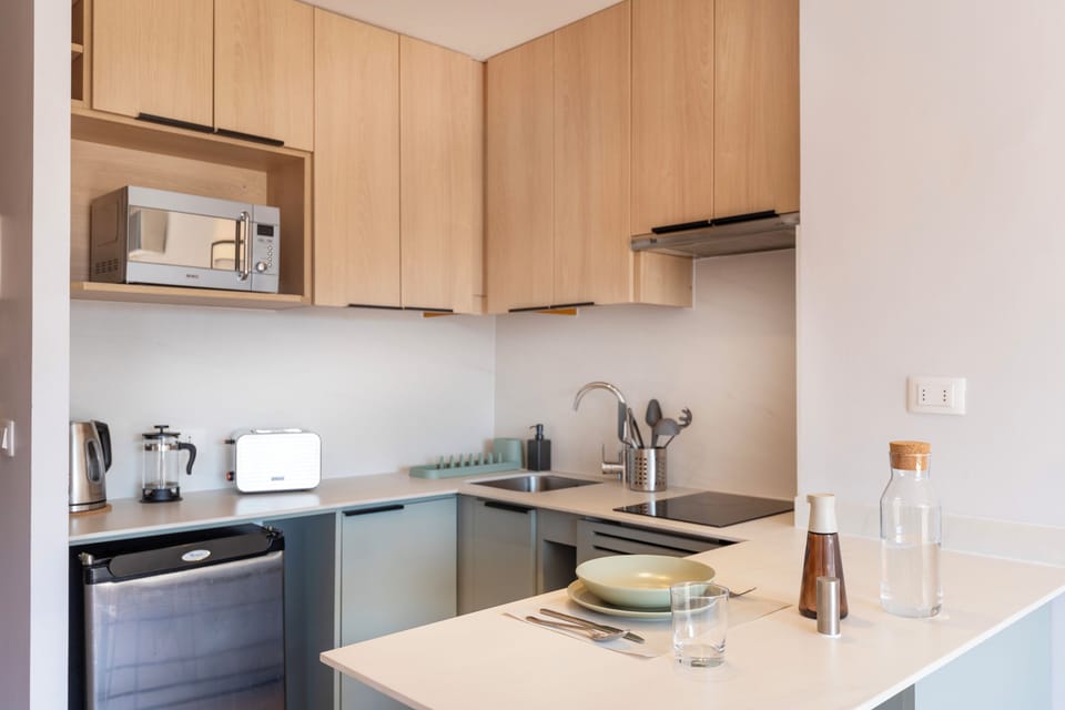 Mini-fridge, microwave, oven, stovetop