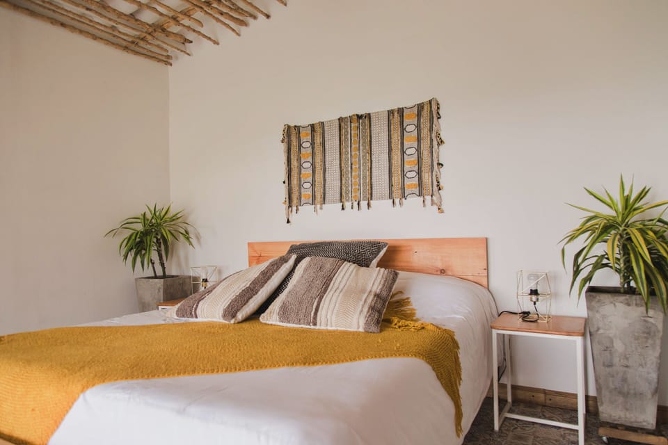 Bungalow, Garden View | Desk, bed sheets