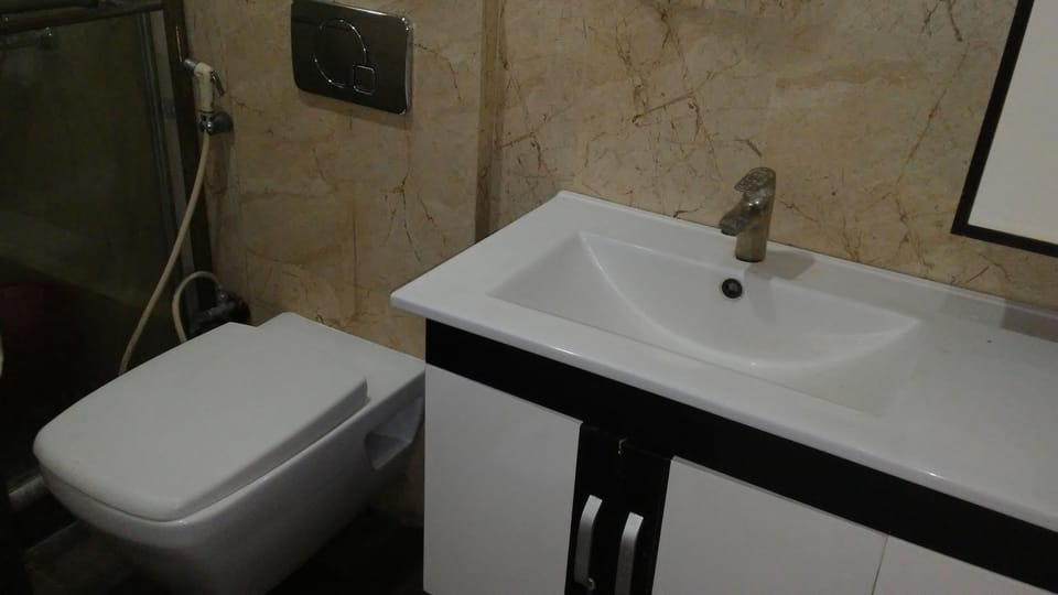 Shower, free toiletries, slippers