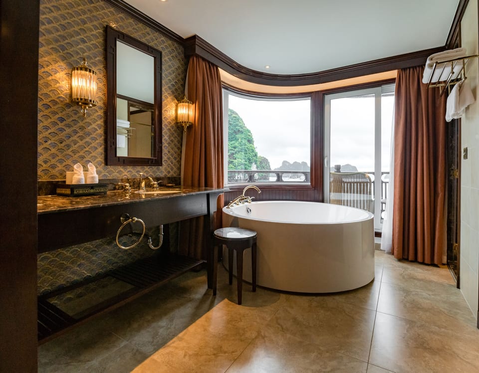 Regent Suite | Bathroom | Separate tub and shower, deep soaking tub, hair dryer, bathrobes