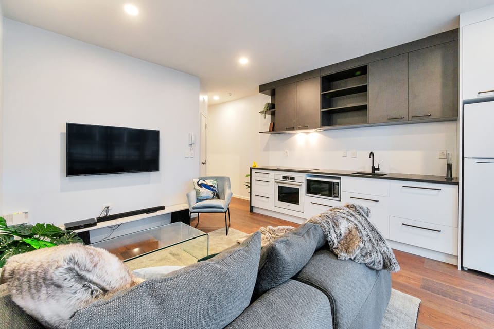Superior Apartment, 1 Queen Bed | Living area | Flat-screen TV