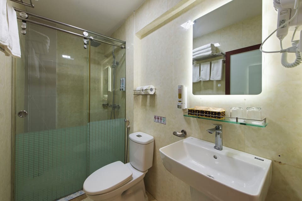 Shower, rainfall showerhead, designer toiletries, hair dryer