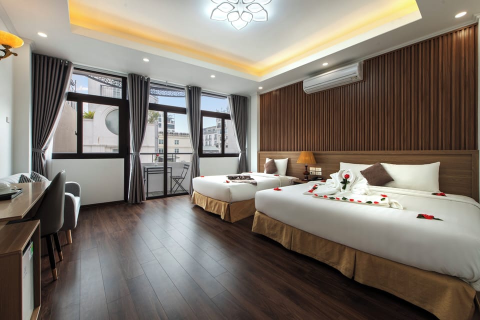 Deluxe Triple Room, Balcony, City View | Premium bedding, down comforters, Select Comfort beds, minibar