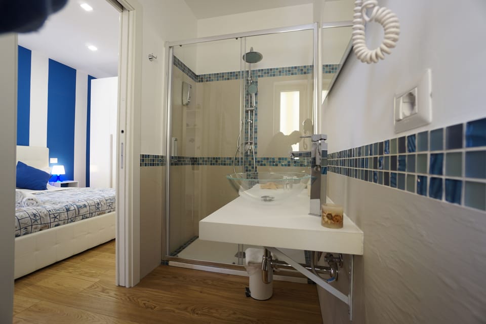 Double Room, 1 Queen Bed, Balcony (Nerano) | Bathroom | Shower, free toiletries, hair dryer, bidet