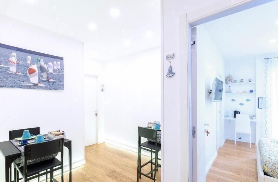 Double Room, 1 Queen Bed, Balcony (Nerano) | Living area | Flat-screen TV