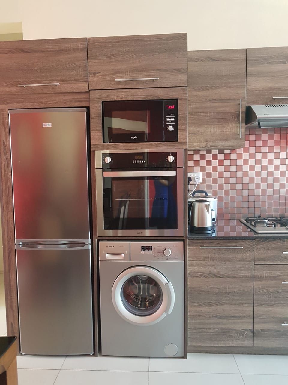Apartment, 3 Bedrooms | Private kitchen | Coffee/tea maker, full-size fridge, microwave, oven
